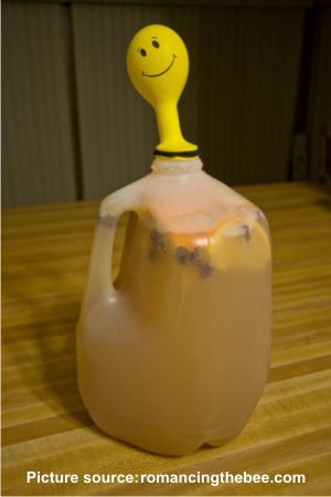 jug capped with a balloon