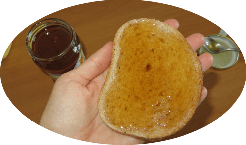 coriander honey on a slice of bread