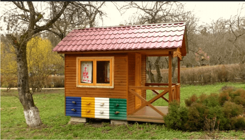 a cottage for sleeping above the bees